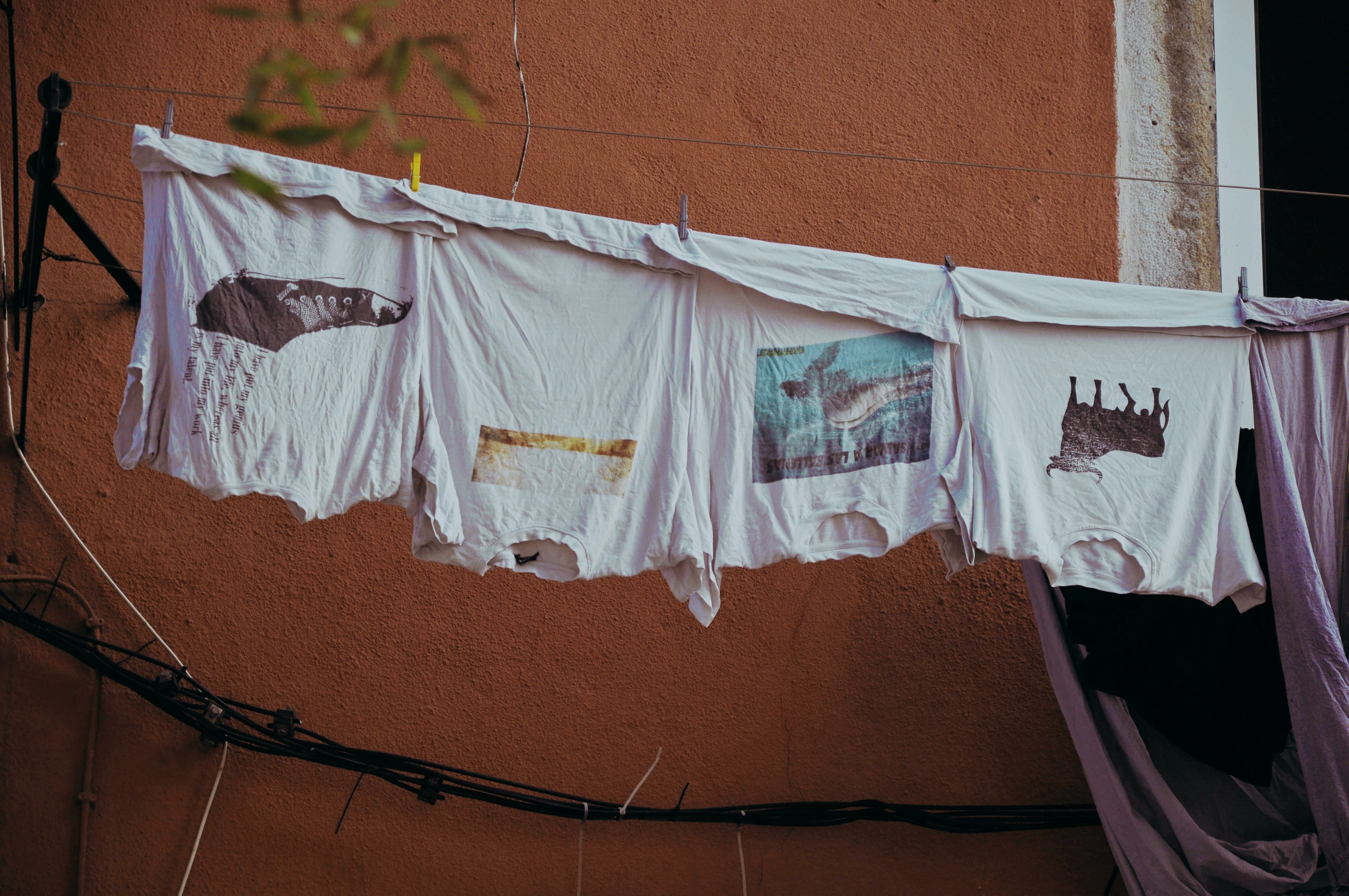 vintage t shirts on a washing line